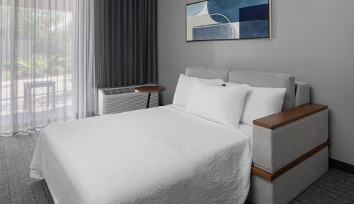 Suite, 1 King Bed with Sofa bed (Mobility Accessible, Roll-In Shower)