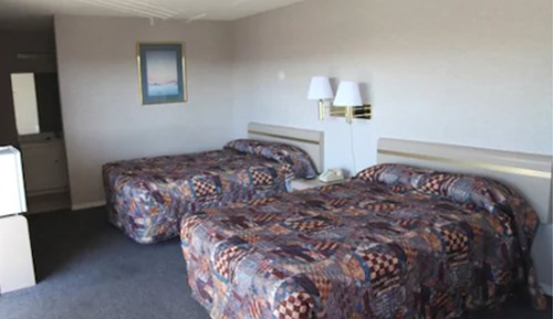 Two Double Beds with 7 Days Parking