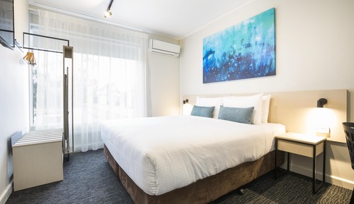 Family Room - One King & Three Single Beds