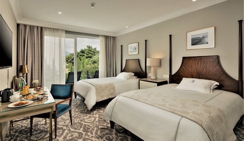 Deluxe Quadruple Room, 2 Queen Beds, Balcony