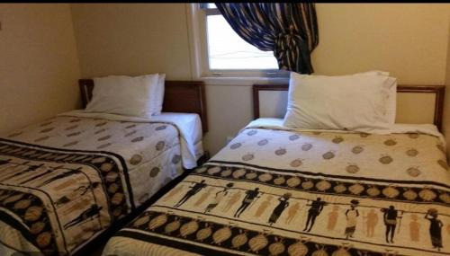 Double Room with Two Double Beds and Private Bathroom