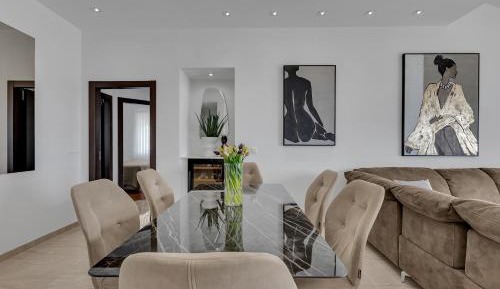 Three-Bedroom Apartment with Terrace and Sea View