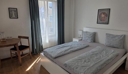 Four-Bedroom Apartment with Balcony 