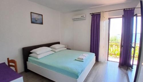 Two-Bedroom Apartment with Balcony and Sea View