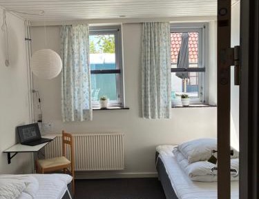 Small Twin Room with Shared Bathroom