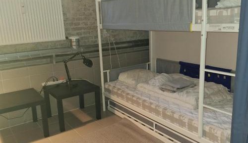 Single Bed in Dormitory Room