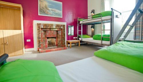 Bunk Bed in Male Dormitory Room with Shared Bathroom