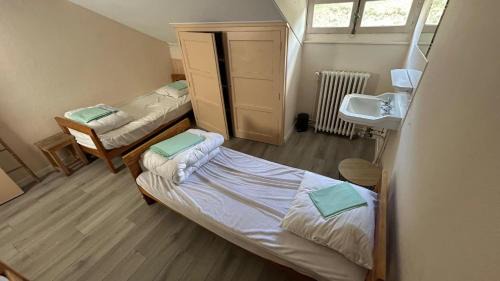 Single Bed in Dormitory Room