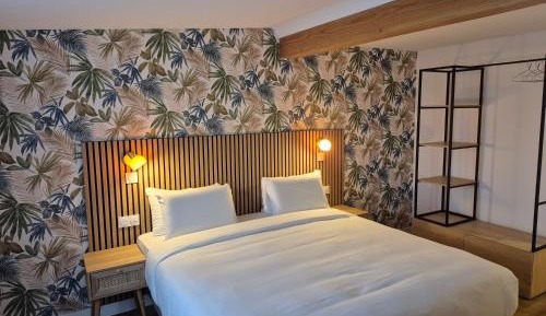 Two-Bedroom Signature King Suite with Sofa Bed