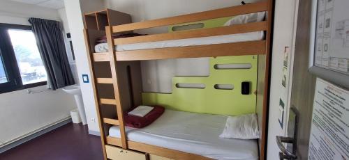 Room with 2 Bunk Beds – Shared Bathroom