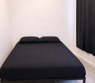 Queen Room with Shared Bathroom