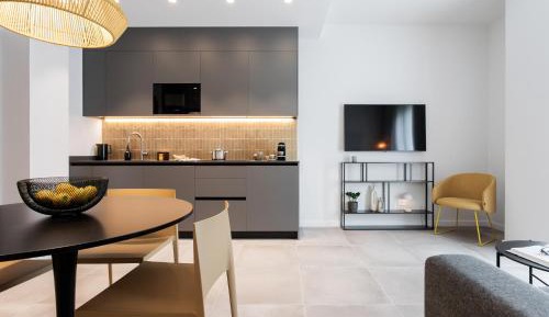 One-Bedroom Apartment with Balcony and City View