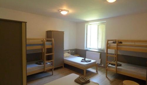 Single Bed in Dormitory Room