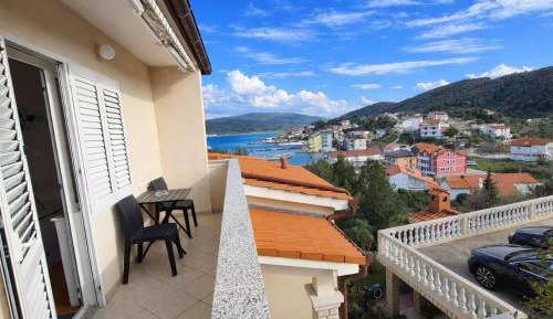 One-Bedroom Apartment with Balcony and Sea View