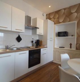 One-Bedroom Apartment with Balcony and Water View