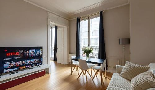 One-Bedroom Apartment with Balcony and City View