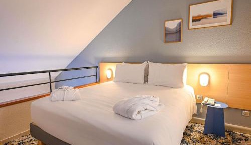 Duplex Privilege Room with a double bed and single sofa bed