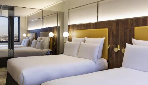 Deluxe Family Room with 2 Double Beds and view on Paris