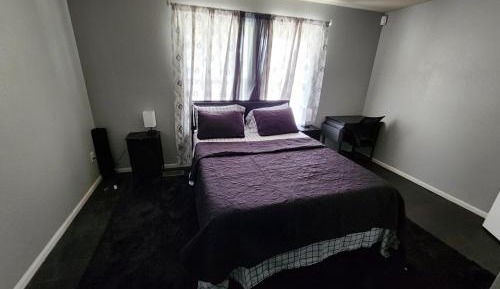 Queen Room with Shared Bathroom