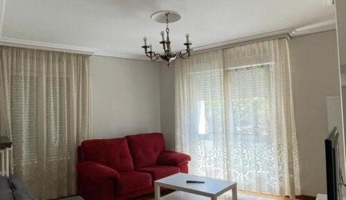 Four-Bedroom Apartment with Balcony 