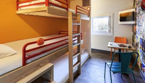 Break Room with Three Single Bunk Beds and Shared Bathroom