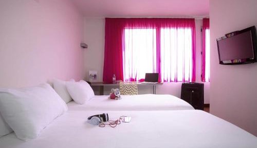 Standard Suite with One Double Bed and Two Single Beds