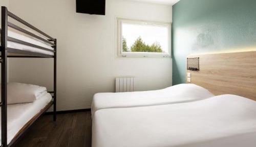 Room with Four Single Beds and Bathroom