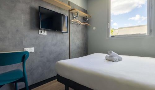 Room with One Queen Bed and One Bunk Bed
