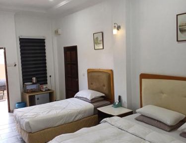 Quadruple Room with Private Bathroom