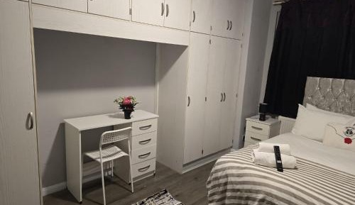 Queen Room with Shared Bathroom