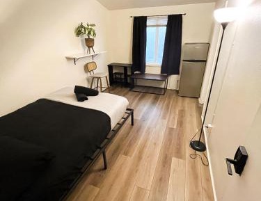 Queen Room with Shared Bathroom