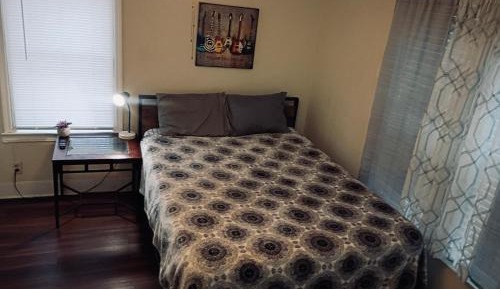 Queen Room with Shared Bathroom