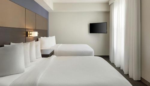 Two-Bedroom Suite with One King Bed and Two Queen Beds