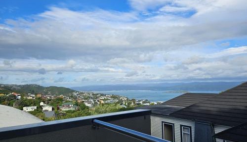 Three-Bedroom Apartment with Harbor View
