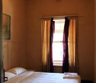 Queen Room with Shared Bathroom