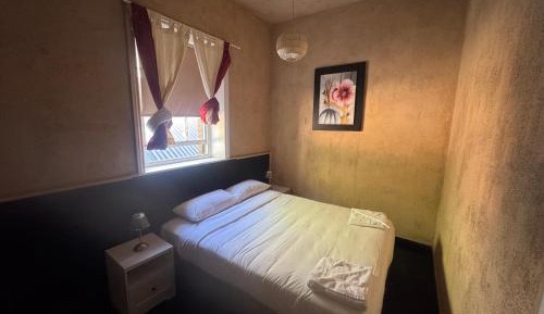 Queen Room with Shared Bathroom