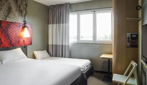 Room with a Double Bed and One Single Bed