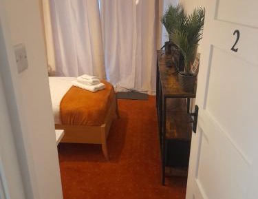 Single Room with Shared Shower and Toilet