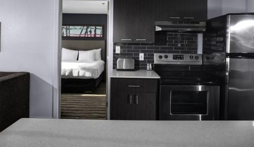 Two-Bedroom Suite with One King Bed and Two Double Beds