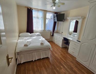 Three-Bedroom Apartment with Balcony