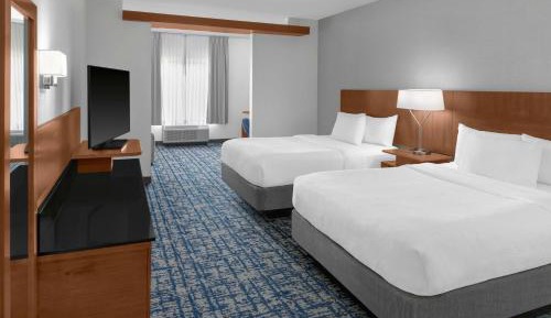 Queen Suite with Two Queen Beds and Sofa Bed