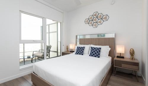 One-Bedroom Apartment with Balcony and City View