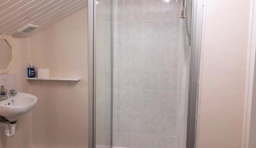 Queen Room with Shared Bathroom