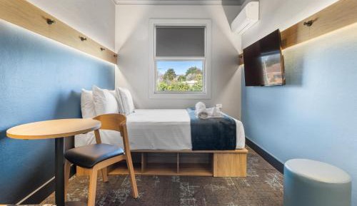 Queen Room with Shared Bathroom