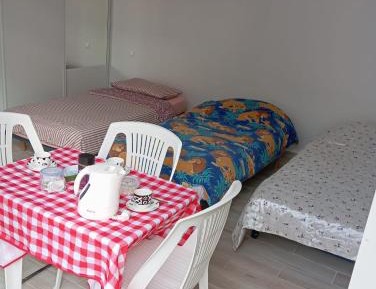 Triple Room with Shared Bathroom