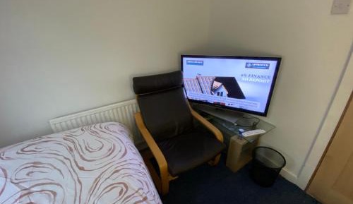 Single Bed in Dormitory Room