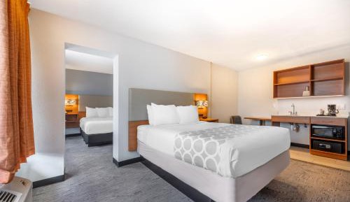 Family Room with One King and One Queen Bed - Non-Smoking