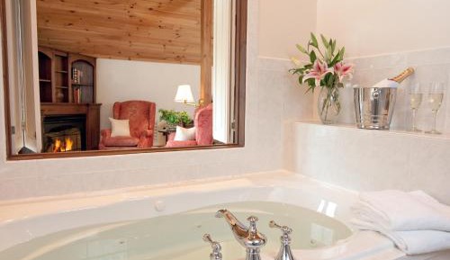 King Room with Jacuzzi Tub and TV and Gas Fireplace