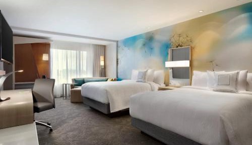 Queen Room with Two Queen Beds and Sofa Bed