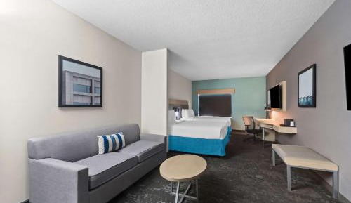 Queen Suite with Two Queen Beds and Sofa Bed